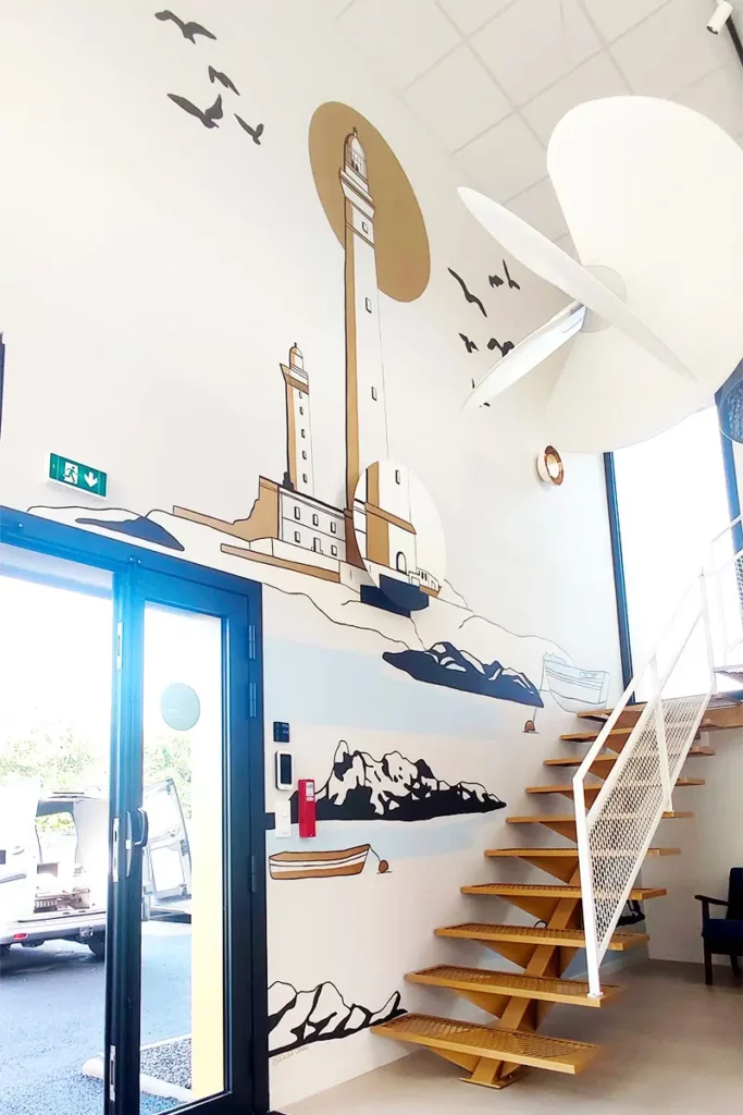 Fresque murale entreprise Bretagne représentant le phare de l’île Vierge dans les locaux de Prolum à Combourg